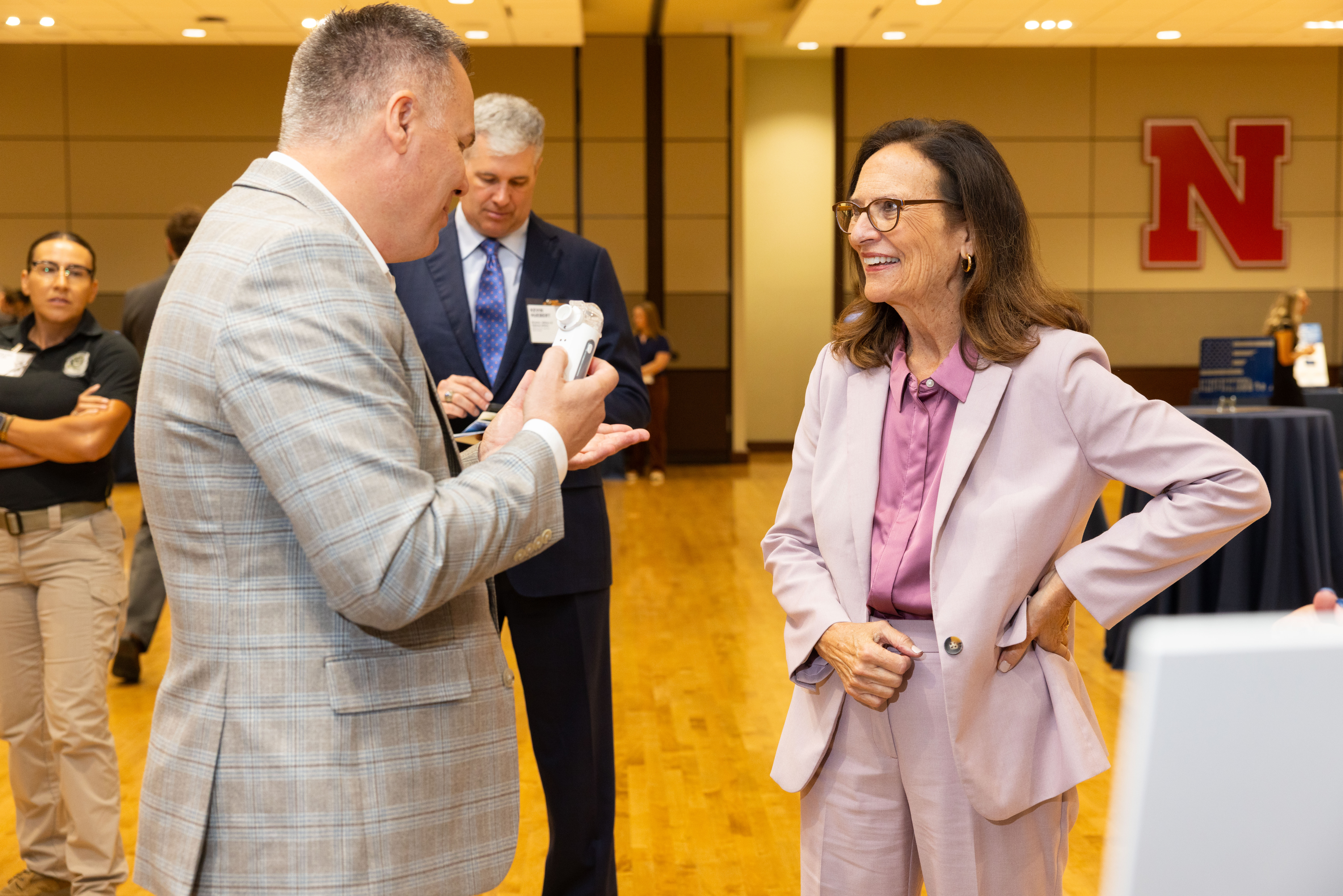 U.S. Senator Deb Fischer talks with NSRI Research Director David Blanchard about his team's capabilities for biological defense, and his specific demonstrated project entitled "Distributed early warning of biological threats."